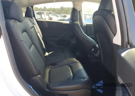 2023 Tesla Model Y from USA, damaged, VIN 7SAYGAEE7PF877589